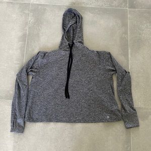 A grey Gapfit Brushed Tech Jersey hoodie.